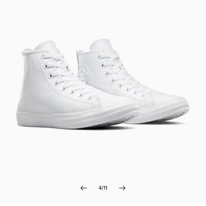 Faux Leather with Sherpa Interior Converse Sneakers

Size 9.5 US
size 41 EU